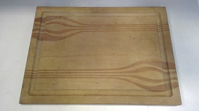 Lot 18 - A Wooden Chopping Board. The Board measures 61....