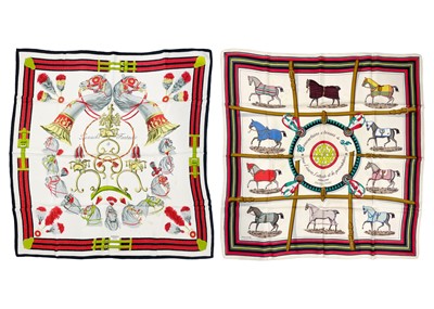 Lot 313 - HERMES - Two equestrian printed silk scarves.