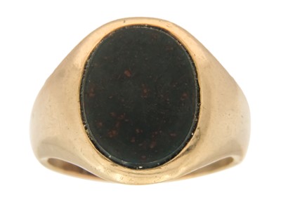 Lot 204 - A 9ct gold (tested) bloodstone set lady's signet ring.