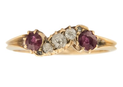 Lot 211 - A Victorian 18ct diamond and ruby set five stone ring.