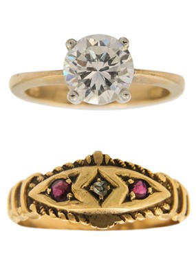 Lot 212 - An Edwardian 18ct diamond and ruby set three stone ring and a 9ct CZ ring.