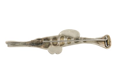 Lot 213 - A Cornelius Jakob Van Dop white metal fish brooch.