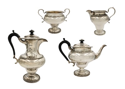 Lot 92 - An Edwardian silver four-piece tea set by Richard Martin & Ebenezer Hall.