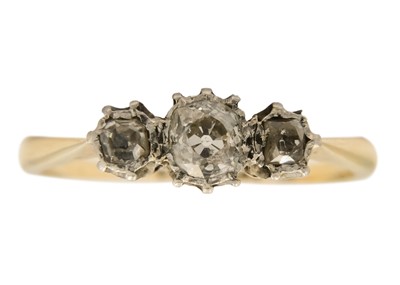 Lot 221 - An 18ct and platinum diamond set three stone ring.