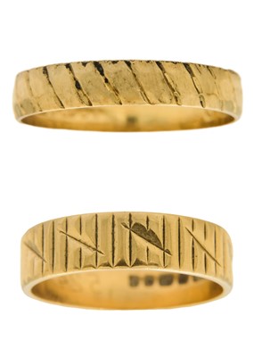 Lot 237 - Two 18ct band rings with carved decoration.