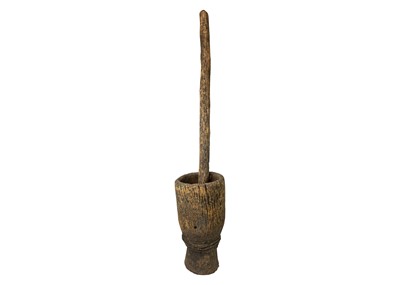 Lot 100 - A Zimbabwean pestle and mortar or grain pounder.