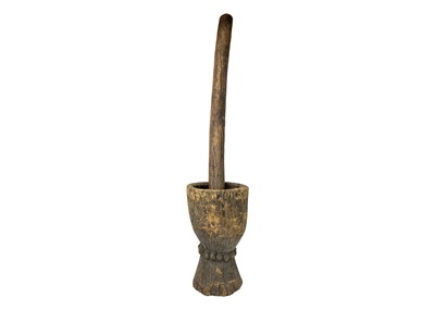 Lot 92 - A Zimbabwean pestle and mortar or grain pounder.