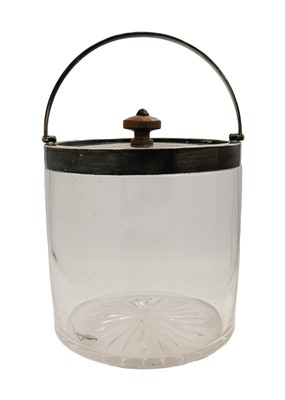 Lot 84 - An Edwardian silver mounted glass biscuit barrel with swing handle by John Grinsell & Sons.