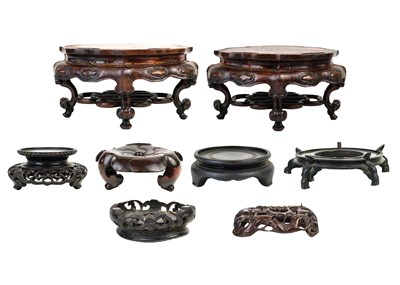 Lot 1008 - A quantity of Chinese hardwood stands.