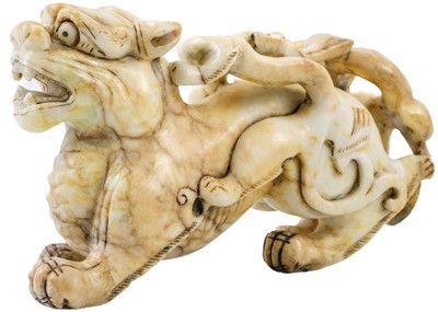 Lot 1011 - A Chinese hardstone model of a kylin, Han style.