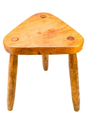 Lot 312 - A St Ives oak three-legged stool.