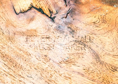 Lot 312 - A St Ives oak three-legged stool.