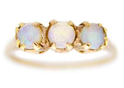 Lot 4 - A 9ct opal set three stone ring.