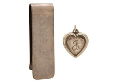 Lot 337 - A Tiffany silver money clip and a Tiffany silver heart-shaped pendant.