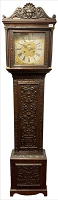 Lot 3319 - A carved oak eight day longcase clock, 17th...