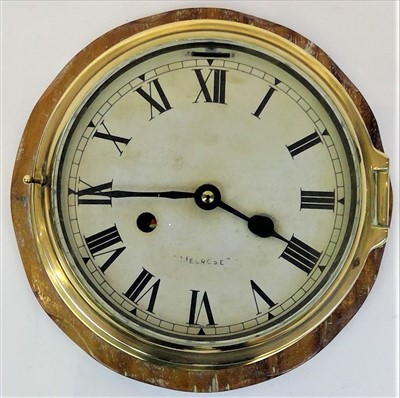 Lot 3304 - A brass wall clock, of bulkhead style, early...