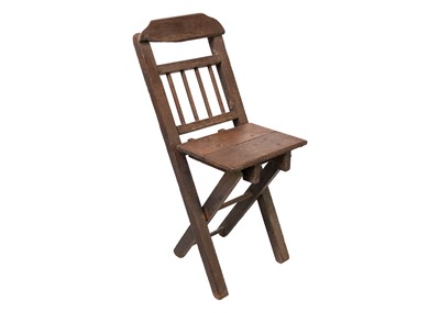 Lot 1292 - An oak child's folding chair.