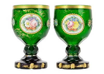 Lot 181 - A pair of Bohemian green glass goblets, 19th century.