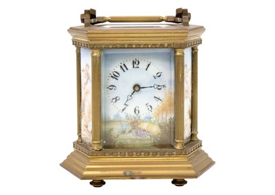 Lot 236 - A hexagonal brass carriage clock.