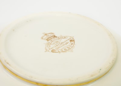 Lot 208 - An unusual Minton porcelain armorial part service.