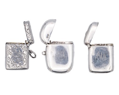 Lot 220 - A group of three hallmarked silver vesta cases.