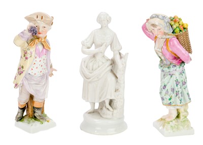 Lot 180 - A pair of Berlin K.P.M figures of fruit pickers.