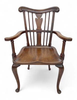 Lot 1132 - A mahogany Windsor comb back armchair.