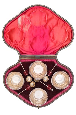 Lot 162 - A Victorian silver set of four salts and spoons within original fitted case by Hilliard & Thomason.