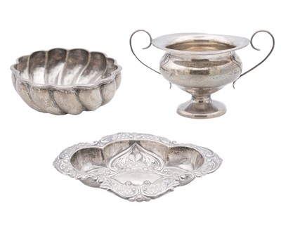 Lot 163 - A modern heavy silver wrythen sugar bowl, a twin handled cup and a bon bon dish.