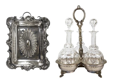 Lot 1357 - A late Victorian silver plated three section decanter frame.