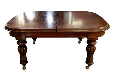 Lot 295 - A Victorian mahogany extending dining table.