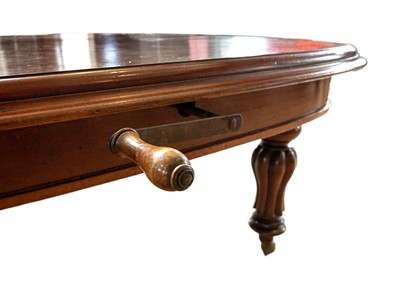 Lot 295 - A Victorian mahogany extending dining table.