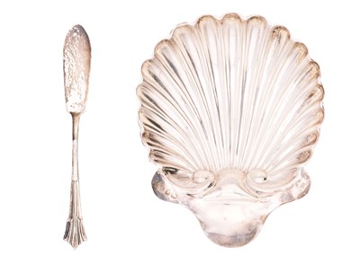 Lot 179 - A Victorian silver scallop shell butter dish and knife set by Josiah Williams & Co.