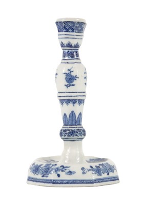 Lot 1079 - A Chinese export blue and white porcelain candlestick, 18th century.