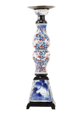 Lot 1080 - A Chinese porcelain candlestick, 18th century.