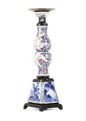 Lot 1080 - A Chinese porcelain candlestick, 18th century.