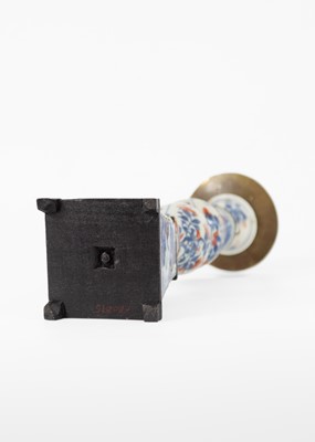 Lot 1080 - A Chinese porcelain candlestick, 18th century.