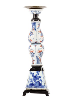 Lot 1080 - A Chinese porcelain candlestick, 18th century.