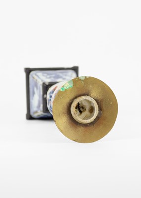 Lot 1080 - A Chinese porcelain candlestick, 18th century.