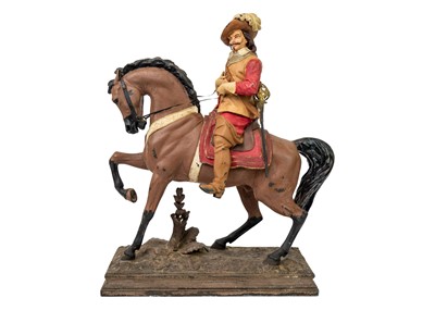 Lot 38 - A painted spelter figure of a Cavalier on horseback.