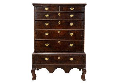 Lot 1165 - A George II oak chest on stand.