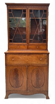 Lot 1669 - A late 19th century Satinwood secretaire bookcase.