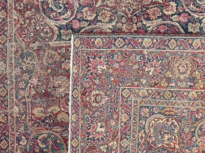 Lot 601 - An antique Persian Kerman rug.