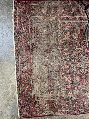 Lot 601 - An antique Persian Kerman rug.