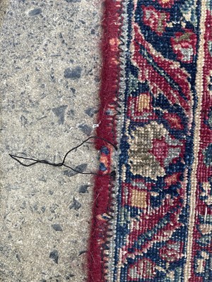 Lot 601 - An antique Persian Kerman rug.