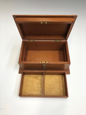 Lot 39 - A Cotswold School cedar box with two division...