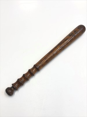 Lot 66 - A late 19th/early 20th century elm truncheon,...