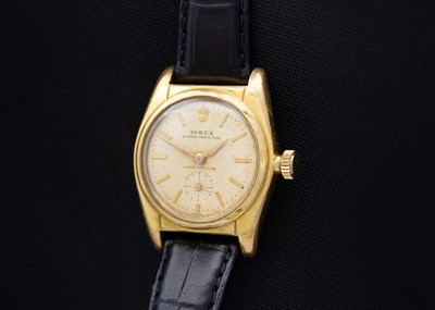 Lot 90 - ROLEX - An Oyster Perpetual Super Precision 'bubble back' gold capped gentleman's wristwatch.