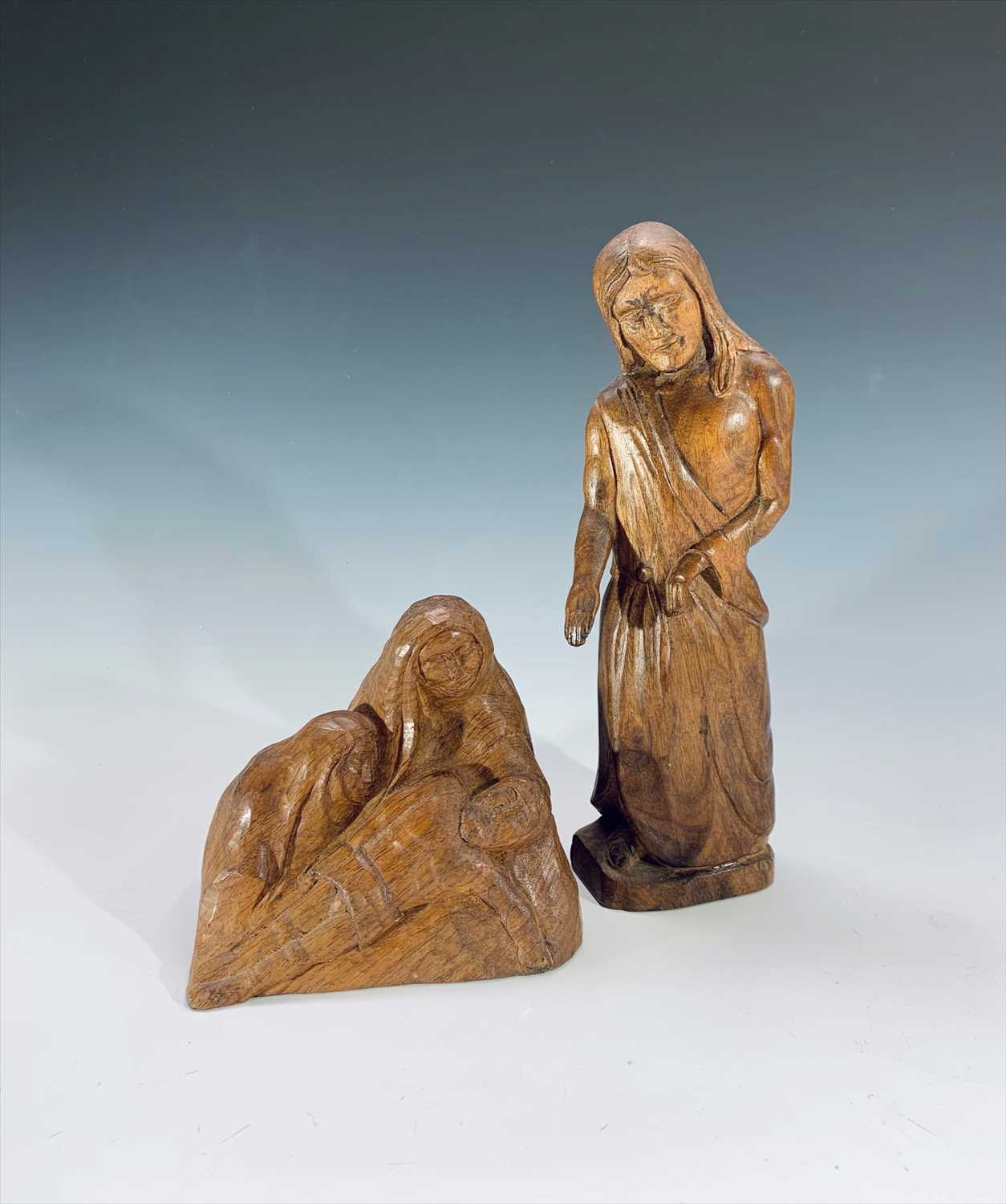 Lot 56 - An oak carving, 'Pieta', height 13cm, together...