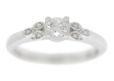 Lot 48 - A 9ct white gold diamond solitaire ring by Emmy of London.